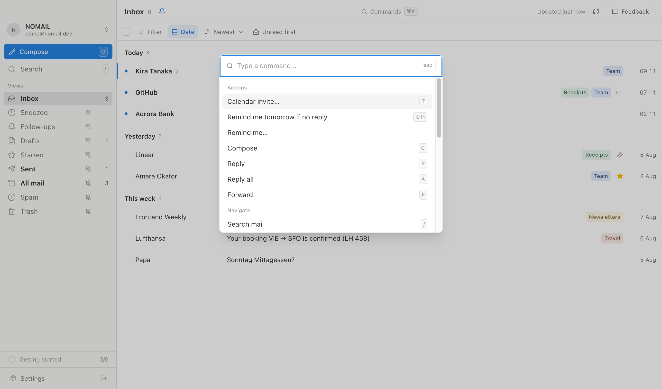 The ⌘K command menu open over the inbox, listing actions with their shortcuts